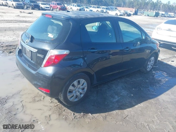 2012 Toyota Yaris L with VIN JTDKTUD33CD504907, listed as a IAAI auction lot 41587510 with 242,307 mi miles. Bid and sale history available at carsss.com. Image 4.