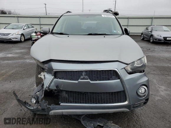 2013 Mitsubishi Outlander SE z VIN JA4JT3AW4DU000656, wystawiony jako Copart lot #51808395 z przebiegiem 158 479 mil mil oraz Szkoda całkowita • Salvage title. Historia ofert i sprzedaży dostępna na DreamBid. Obrazek 5.