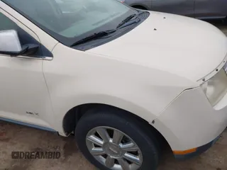 2007 Lincoln MKX with VIN 2LMDU68C57BJ17122, listed as a IAAI auction lot 41706762 with 170,982 mi miles. Bid and sale history available at carsss.com. Image 6.