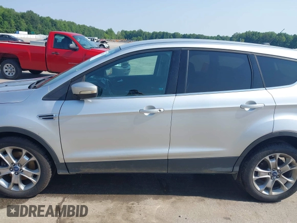2013 Ford Escape SEL with VIN 1FMCU9H99DUA11243, listed as a IAAI auction lot 42356731 with 154,937 mi miles and . Bid and sale history available at DreamBid. Image 14.