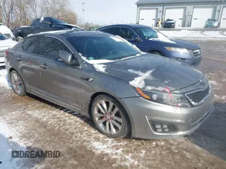 2015 Kia Optima SX Turbo with VIN 5XXGR4A63FG449274, listed as a IAAI auction lot 41600422 with 158,133 mi miles. Bid and sale history available at carsss.com. Image 1.