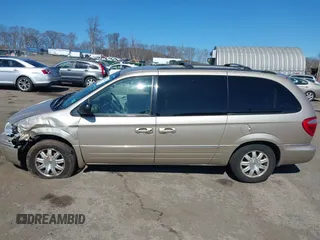 2006 Chrysler Town & Country Touring with VIN 2A8GP54L06R727898, listed as a IAAI auction lot 41893586 with 119,296 mi miles and . Bid and sale history available at DreamBid. Image 14.