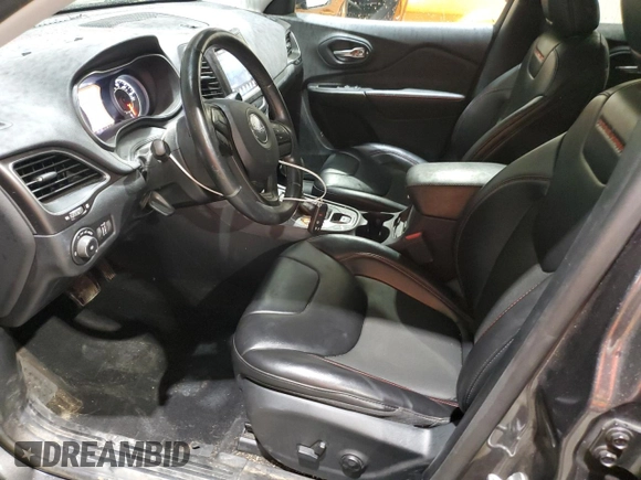 2020 Jeep Cherokee Trailhawk z VIN 1C4PJMBX5LD591873, wystawiony jako Copart lot #54308695 z przebiegiem 34 615 mil mil oraz Szkoda całkowita • Salvage title. Historia ofert i sprzedaży dostępna na DreamBid. Obrazek 7.