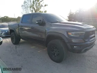 2022 Ram 1500 TRX with VIN 1C6SRFU98NN119622, listed as a IAAI auction lot 40557197 with 54,045 mi miles. Bid and sale history available at carsss.com. Image 1.