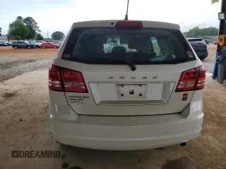 2013 Dodge Journey American Value with VIN 3C4PDCAB5DT656997, listed as a Copart auction lot 57123565 with 201,799 mi miles and Salvage title. Bid and sale history available at DreamBid. Image 6.
