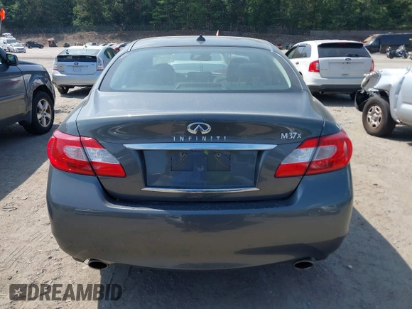 2012 Infiniti M with VIN JN1BY1AR3CM390550, listed as a IAAI auction lot 42797466 with 177,338 mi miles and . Bid and sale history available at DreamBid. Image 16.