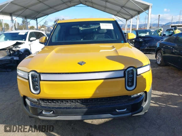 2022 Rivian R1T Adventure Package with VIN 7FCTGAAA2NN005811, listed as a IAAI auction lot 41706558 with 21,336 mi miles. Bid and sale history available at carsss.com. Image 12.