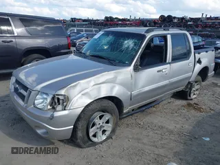2005 Ford Explorer Sport Trac XLS z VIN 1FMZU67K15UA98747, wystawiony jako IAAI lot #42014293 z przebiegiem 231 902 mil mil oraz . Historia ofert i sprzedaży dostępna na DreamBid. Obrazek 2.