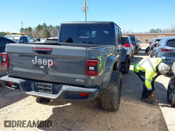 2020 Jeep Gladiator Overland z VIN 1C6HJTFG4LL143369, wystawiony jako IAAI lot #41827409 z przebiegiem 77 752 mil mil oraz . Historia ofert i sprzedaży dostępna na DreamBid. Obrazek 4.