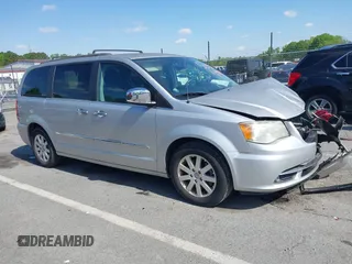 2012 Chrysler Town & Country Touring L with VIN 2C4RC1CG1CR245008, listed as a IAAI auction lot 41951680 with 98,656 mi miles and . Bid and sale history available at DreamBid. Image 1.