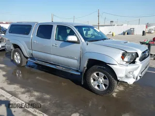2013 Toyota Tacoma PreRunner with VIN 3TMKU4HN8DM034338, listed as a IAAI auction lot 41808842 with 142,012 mi miles and . Bid and sale history available at DreamBid. Image 1.