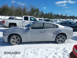 2014 Dodge Charger SXT with VIN 2C3CDXJG2EH135638, listed as a IAAI auction lot 41557427 with 83,536 mi miles. Bid and sale history available at carsss.com. Image 14.