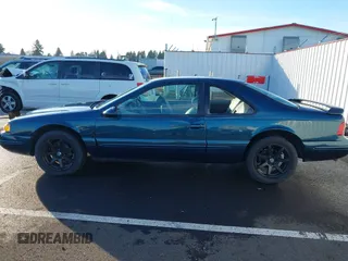 1996 Ford Thunderbird LX with VIN 1FALP62W1TH100925, listed as a IAAI auction lot 41289811 with 84,056 mi miles and . Bid and sale history available at DreamBid. Image 14.