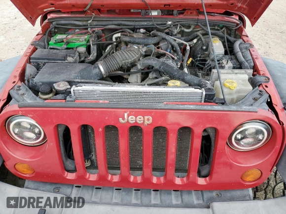 2008 Jeep Wrangler X with VIN 1J4FA24188L503687, listed as a Copart auction lot 61810715 with 117,489 mi miles and Salvage title. Bid and sale history available at DreamBid. Image 12.