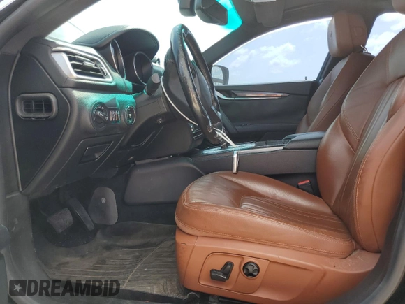 2016 Maserati Ghibli z VIN ZAM57XSAXG1174741, wystawiony jako Copart lot #51975655 z przebiegiem 127 182 mil mil oraz Tytuł czysty. Historia ofert i sprzedaży dostępna na DreamBid. Obrazek 7.