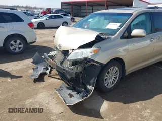 2012 Toyota Sienna XLE AAS with VIN 5TDYK3DC0CS202891, listed as a IAAI auction lot 41938594 with Not Provided miles and . Bid and sale history available at carsss.com. Image 20.
