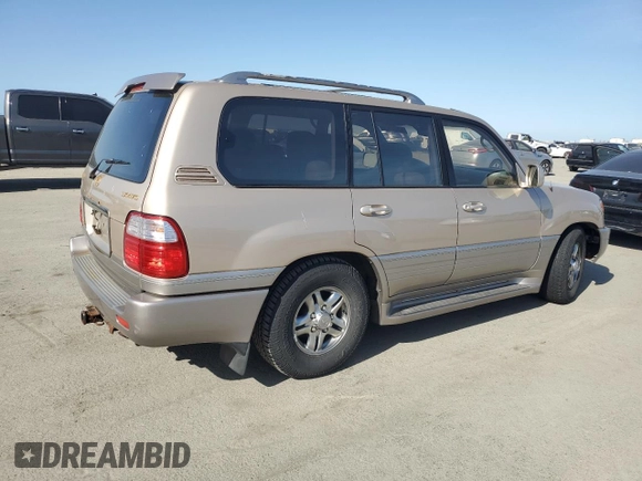 2001 Lexus LX 470 z VIN JTJHT00W213507042, wystawiony jako Copart lot #52634195 z przebiegiem 179 707 mil mil oraz Tytuł czysty. Historia ofert i sprzedaży dostępna na DreamBid. Obrazek 3.