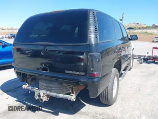 2001 Chevrolet Tahoe LT with VIN 1GNEC13T31R122882, listed as a IAAI auction lot 41999271 with 211,687 mi miles. Bid and sale history available at carsss.com. Image 4.