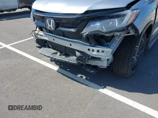 2021 Honda Pilot Special Edition with VIN 5FNYF6H27MB094704, listed as a IAAI auction lot 41953899 with 55,462 mi miles and . Bid and sale history available at DreamBid. Image 6.