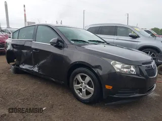 2014 Chevrolet Cruze 1LT with VIN 1G1PC5SB7E7286275, listed as a IAAI auction lot 42351350 with 104,317 mi miles and . Bid and sale history available at DreamBid. Image 1.