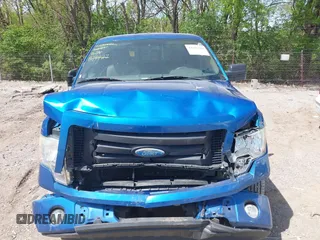 2009 Ford F-150 STX with VIN 1FTRX12839FB34927, listed as a IAAI auction lot 42112489 with 221,371 mi miles and . Bid and sale history available at DreamBid. Image 6.
