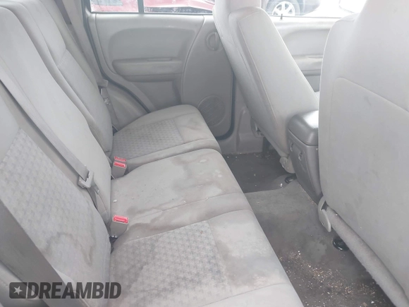 2006 Jeep Liberty Sport with VIN 1J4GL48K76W288408, listed as a IAAI auction lot 39990700 with 215,716 mi miles. Bid and sale history available at carsss.com. Image 8.