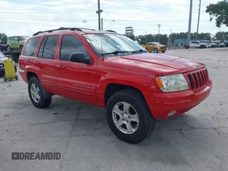 1999 Jeep Grand Cherokee Limited with VIN 1J4GW68N1XC745441, listed as a IAAI auction lot 42455667 with 232,200 mi miles and . Bid and sale history available at DreamBid. Image 1.