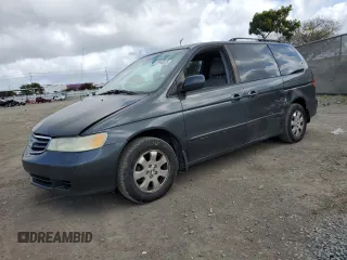2004 Honda Odyssey EX-L with VIN 5FNRL18944B052617, listed as a Copart auction lot 51443625 with 144,346 mi miles and Salvage Title. Bid and sale history available at DreamBid. Image 1.