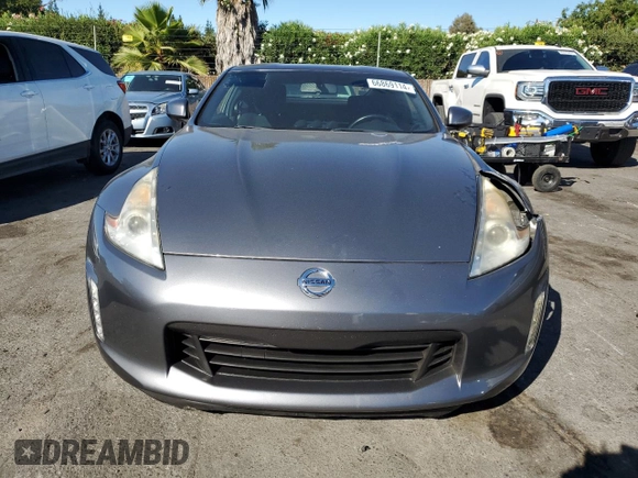 2013 Nissan 370Z with VIN JN1AZ4EH0DM380409, listed as a Copart auction lot 66869114 with 0 mi miles and Salvage Title. Bid and sale history available at carsss.com. Image 5.