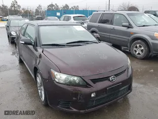2011 Scion tC with VIN JTKJF5C75B3001292, listed as a IAAI auction lot 41539071 with 133,736 mi miles. Bid and sale history available at carsss.com. Image 1.