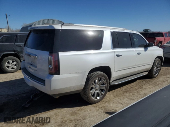 2016 GMC Yukon XL Denali with VIN 1GKS2HKJ5GR225936, listed as a Copart auction lot 49353985 with 207,658 mi miles and Salvage Title. Bid and sale history available at DreamBid. Image 3.