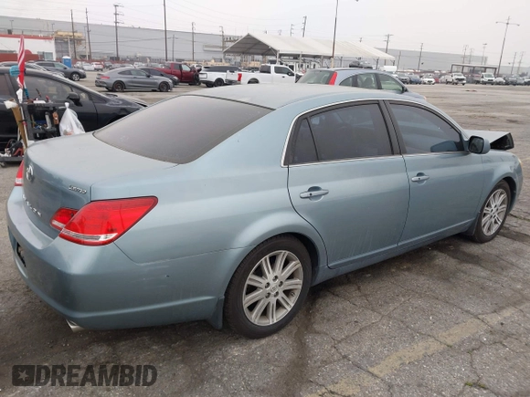2007 Toyota Avalon XL with VIN 4T1BK36B07U233873, listed as a IAAI auction lot 42042179 with 58,612 mi miles. Bid and sale history available at carsss.com. Image 4.