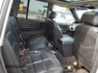 1998 Jeep Grand Cherokee Limited с VIN 1J4GZ78Y0WC245194, выставлен на аукционе Copart как лот 57838825 с пробегом 199 412 миль миль и Списание • Salvage title. История ставок и продаж доступна на DreamBid. Изображение 10.