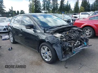 2012 Ford Focus SEL with VIN 1FAHP3M2XCL106248, listed as a IAAI auction lot 42088933 with 117,333 mi miles. Bid and sale history available at carsss.com. Image 1.
