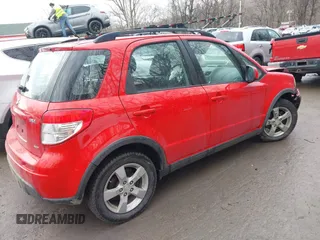 2011 Suzuki SX4 Crossover with VIN JS2YB5A39B6301570, listed as a IAAI auction lot 41666875 with 103,724 mi miles. Bid and sale history available at carsss.com. Image 4.