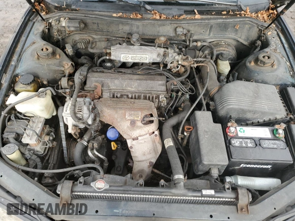 1994 Toyota Camry z VIN 4T1SK12W5RU365849, wystawiony jako Copart lot #44363565 z przebiegiem 226 124 mil mil oraz Szkoda całkowita • Salvage title. Historia ofert i sprzedaży dostępna na DreamBid. Obrazek 11.
