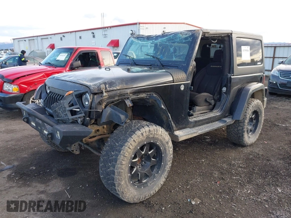 2014 Jeep Wrangler Sahara with VIN 1C4AJWBG5EL247812, listed as a IAAI auction lot 40909884 with 106,475 mi miles and . Bid and sale history available at DreamBid. Image 17.