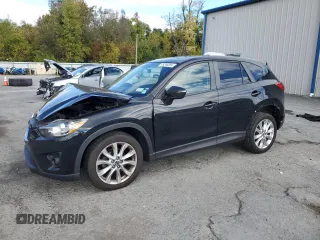2015 Mazda CX-5 Grand Touring with VIN JM3KE4DY2F0480639, listed as a Copart auction lot 75248594 with 104,652 mi miles and Non Repairable. Bid and sale history available at carsss.com. Image 1.