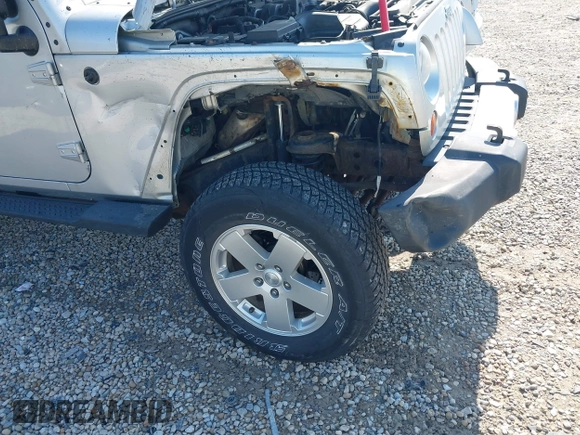 2012 Jeep Wrangler Unlimited Altitude z VIN 1C4HJWEGXCL120397, wystawiony jako IAAI lot #42219976 z przebiegiem 119 172 mil mil oraz . Historia ofert i sprzedaży dostępna na DreamBid. Obrazek 12.