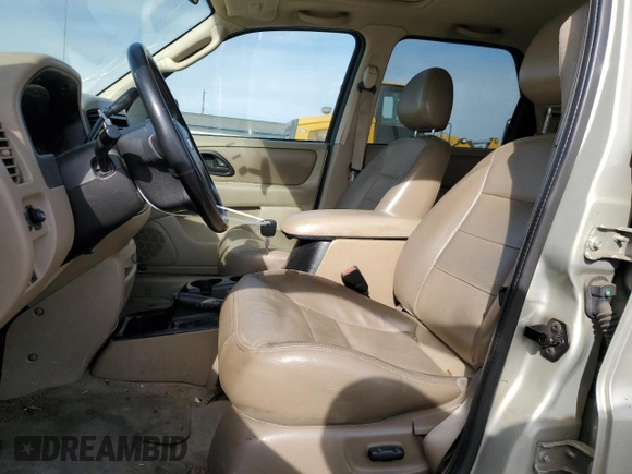 2003 Ford Escape XLT Popular 2 with VIN 1FMYU93143KC64939, listed as a Copart auction lot 75284884 with 147,352 mi miles and Salvage Title. Bid and sale history available at carsss.com. Image 7.