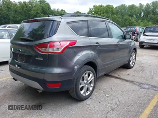 2013 Ford Escape SEL z VIN 1FMCU0H96DUC33699, wystawiony jako IAAI lot #42779073 z przebiegiem 120 992 mil mil oraz . Historia ofert i sprzedaży dostępna na DreamBid. Obrazek 4.