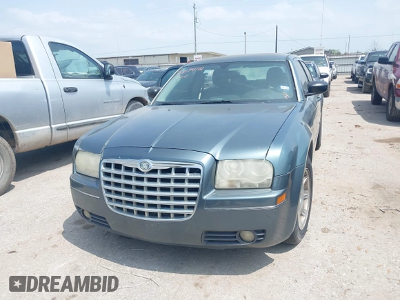 2006 Chrysler 300 Touring with VIN 2C3KA53G16H151319, listed as a IAAI auction lot 41917412 with 245,741 mi miles. Bid and sale history available at carsss.com. Image 6.