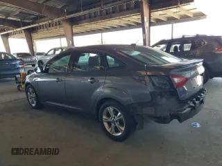 2012 Ford Focus SE with VIN 1FAHP3F28CL114572, listed as a Copart auction lot 63053035 with 142,994 mi miles and Salvage title. Bid and sale history available at DreamBid. Image 2.
