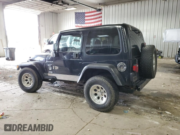 2002 Jeep Wrangler Sport with VIN 1J4FA49S62P713475, listed as a Copart auction lot 59299965 with 114,654 mi miles and Non repairable. Bid and sale history available at DreamBid. Image 2.