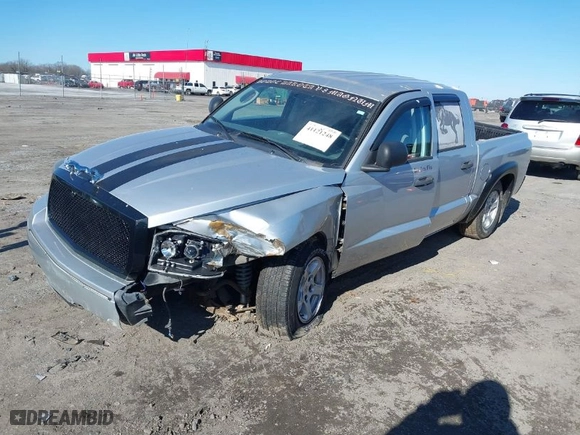 2006 Dodge Dakota SLT with VIN 1D7HE48N76S640351, listed as a IAAI auction lot 41121248 with 155,463 mi miles. Bid and sale history available at carsss.com. Image 2.