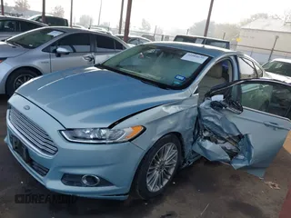 2014 Ford Fusion SE Hybrid with VIN 3FA6P0LU8ER283409, listed as a IAAI auction lot 40984629 with 206,605 mi miles. Bid and sale history available at carsss.com. Image 14.