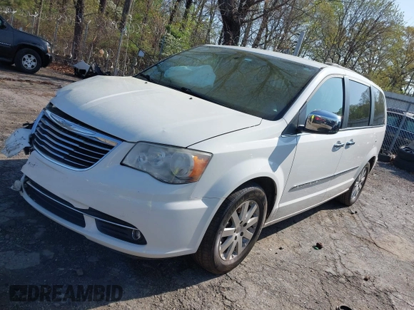 2012 Chrysler Town & Country Touring L with VIN 2C4RC1CGXCR163522, listed as a IAAI auction lot 41923296 with 218,342 mi miles and . Bid and sale history available at DreamBid. Image 2.