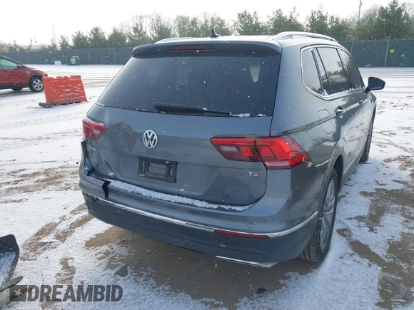 2018 Volkswagen Tiguan SEL Premium with VIN 3VV5B7AX9JM103745, listed as a IAAI auction lot 40993940 with 67,398 mi miles and . Bid and sale history available at DreamBid. Image 4.
