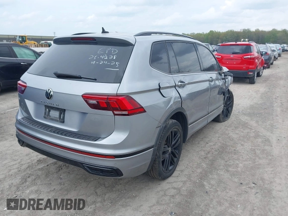 2022 Volkswagen Tiguan SE R-Line Black с VIN 3VVCB7AX1NM065960, выставлен на аукционе IAAI как лот 42149626 с пробегом 71 698 миль миль и . История ставок и продаж доступна на DreamBid. Изображение 4.