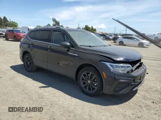 2022 Volkswagen Tiguan SE with VIN 3VV3B7AX2NM077616, listed as a Copart auction lot 57145995 with 53,495 mi miles and Salvage title. Bid and sale history available at DreamBid. Image 4.
